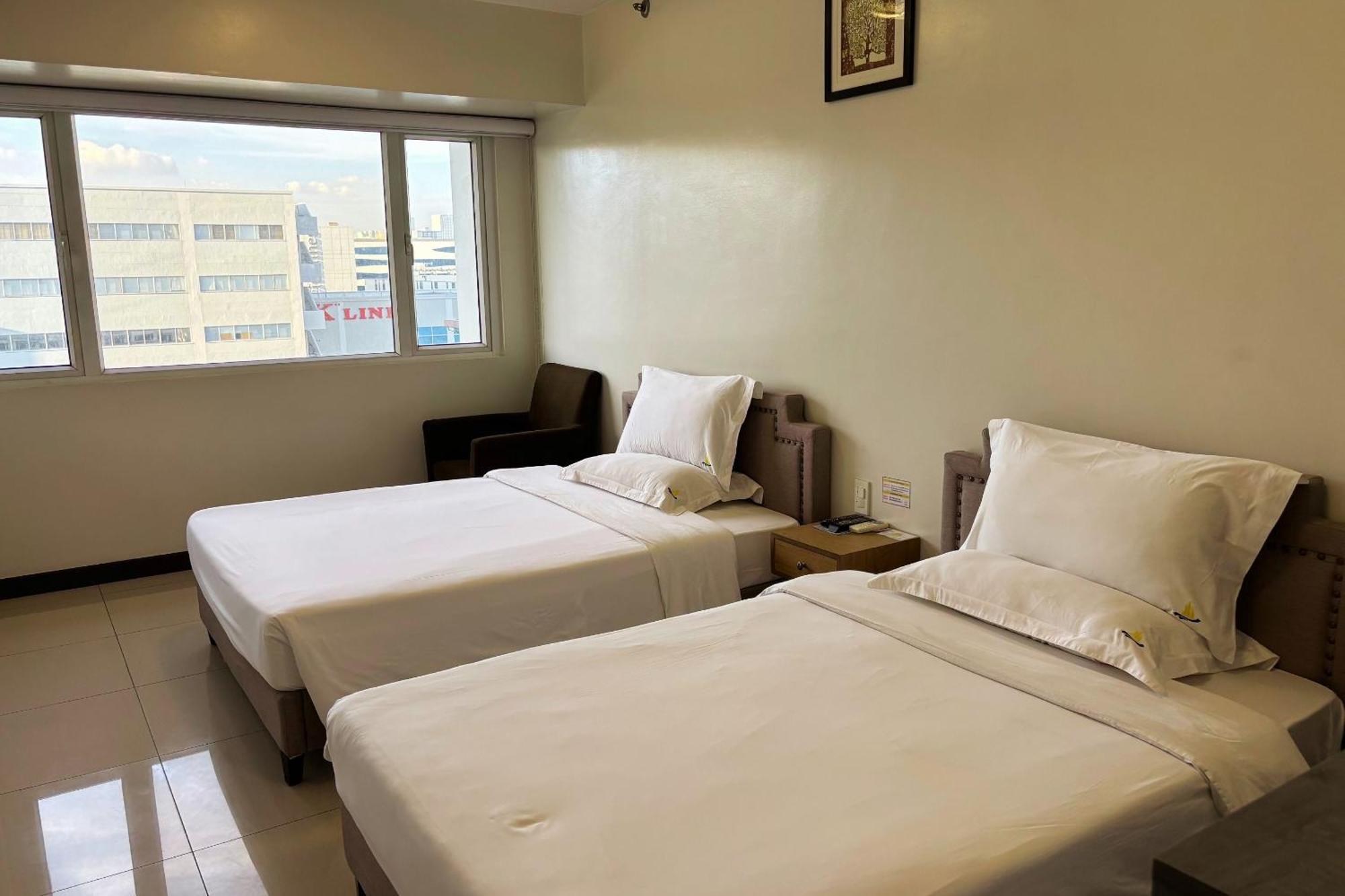 Extremeli Suites Manila Powered By Cocotel Экстерьер фото